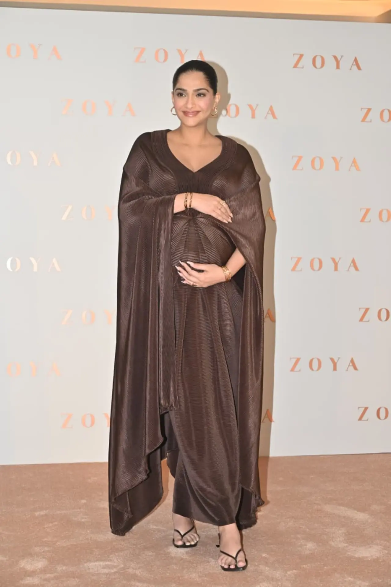 Sonam Kapoor made a fashionable appearance in the city as she attended an event in a gorgeous brown dress, marking her last public appearance before going on her maternity break.